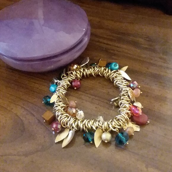 Gold stretch bracelet with charms - Picture 2 of 5